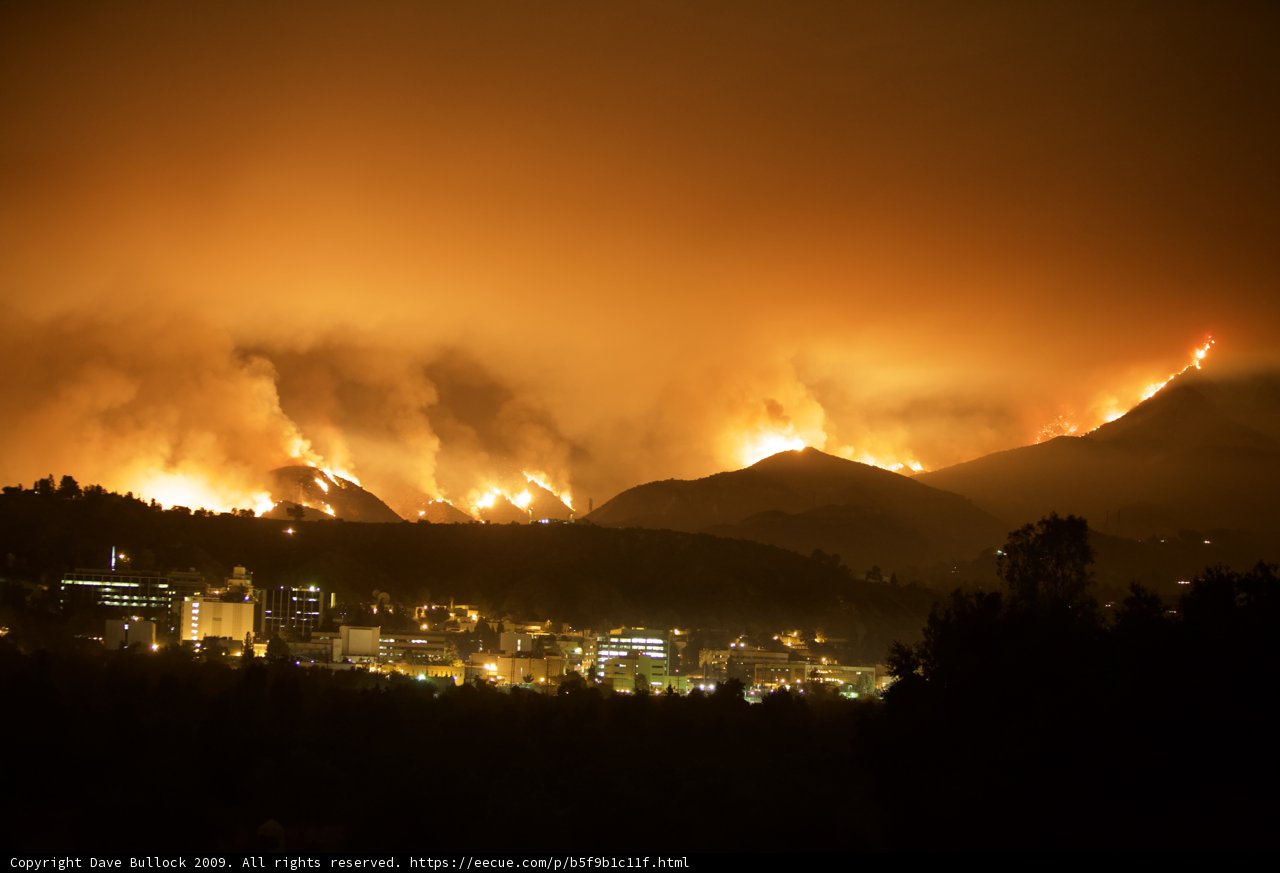 Blaze Erupts in Mountains, Threatening City