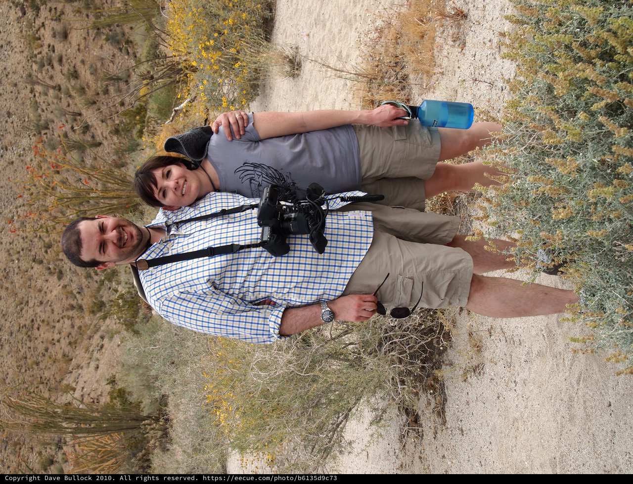 Couple Hiking Through Desert Wilderness Trail