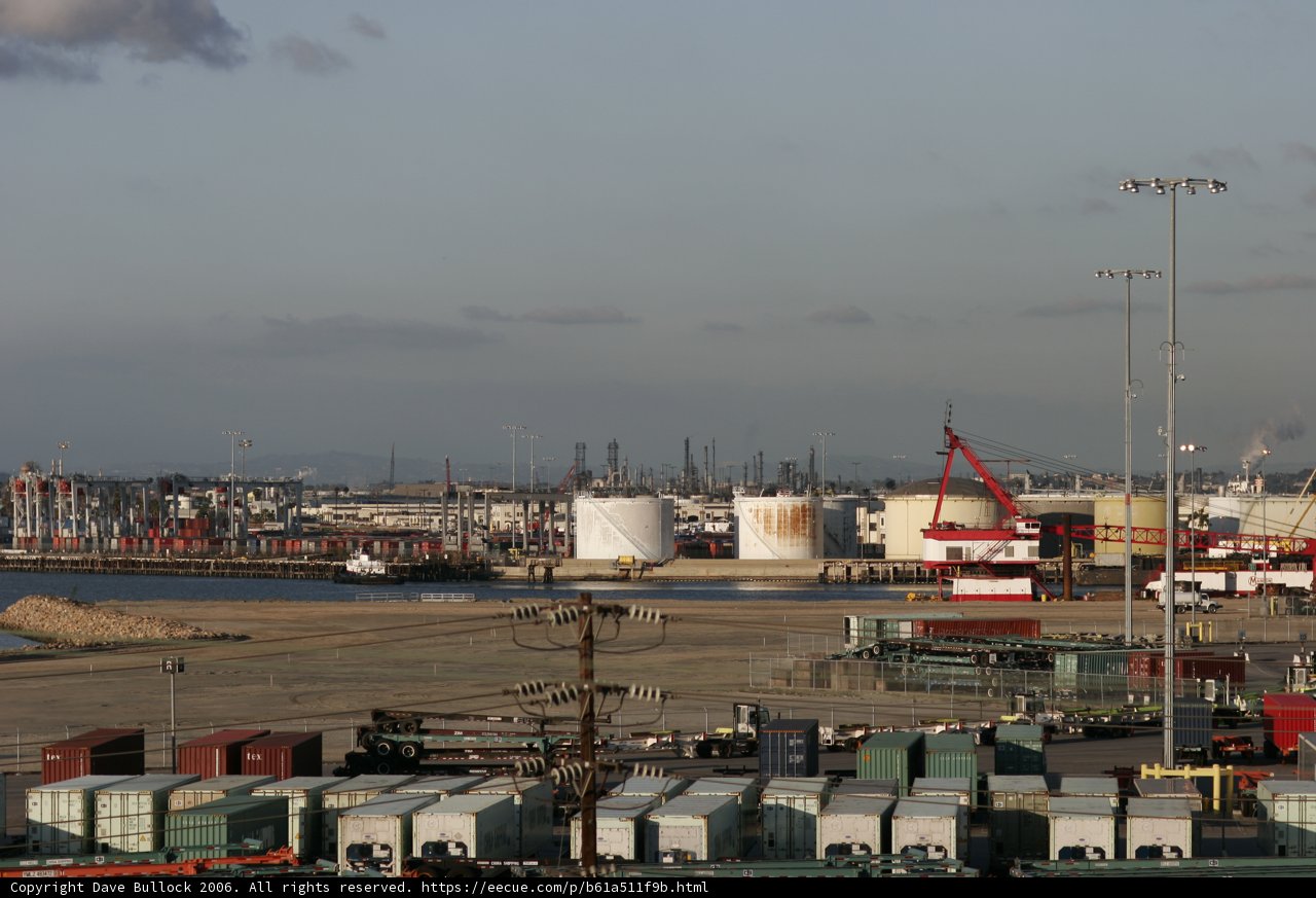 Harbor Waterfront with Factory and Construction Crane