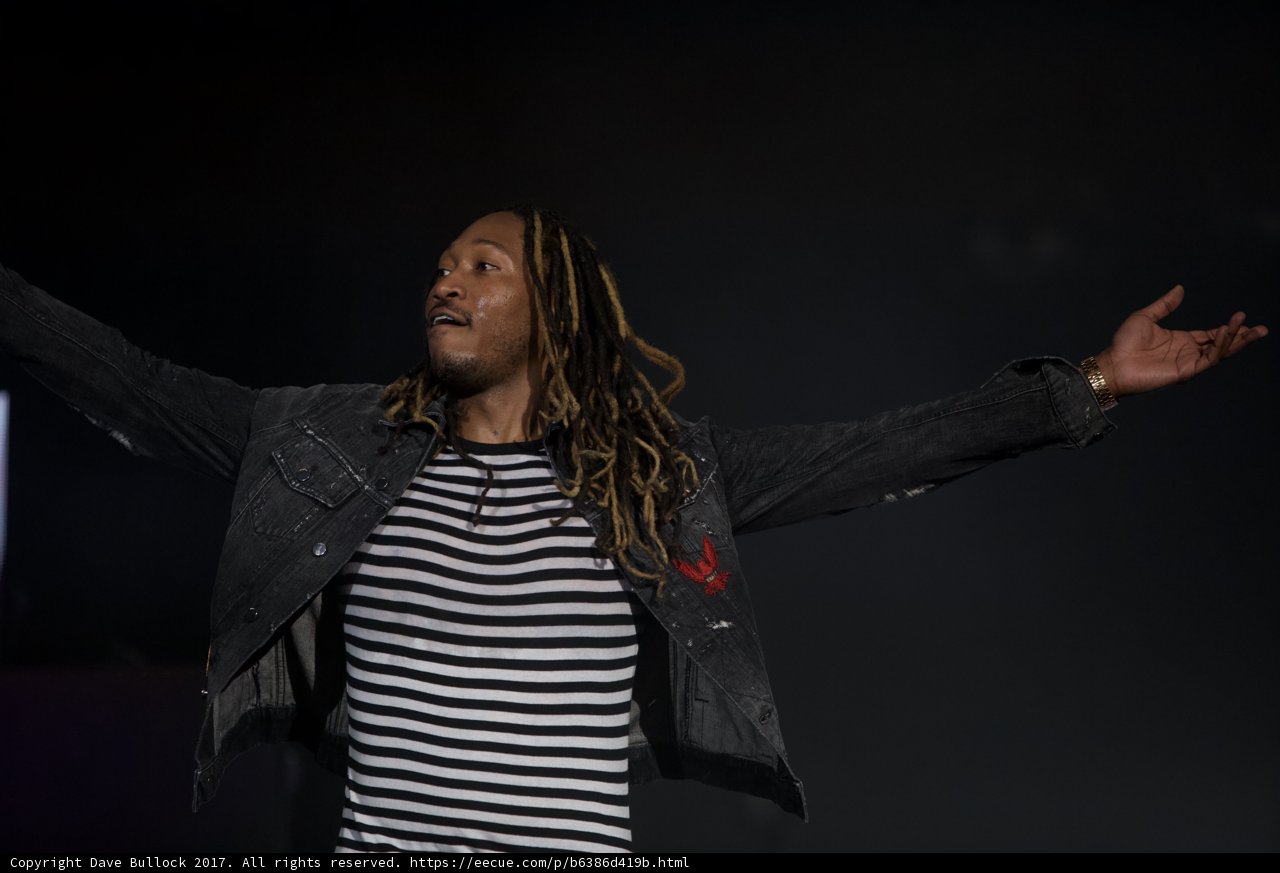 Solo Performance in Striped Shirt and Dreadlocks