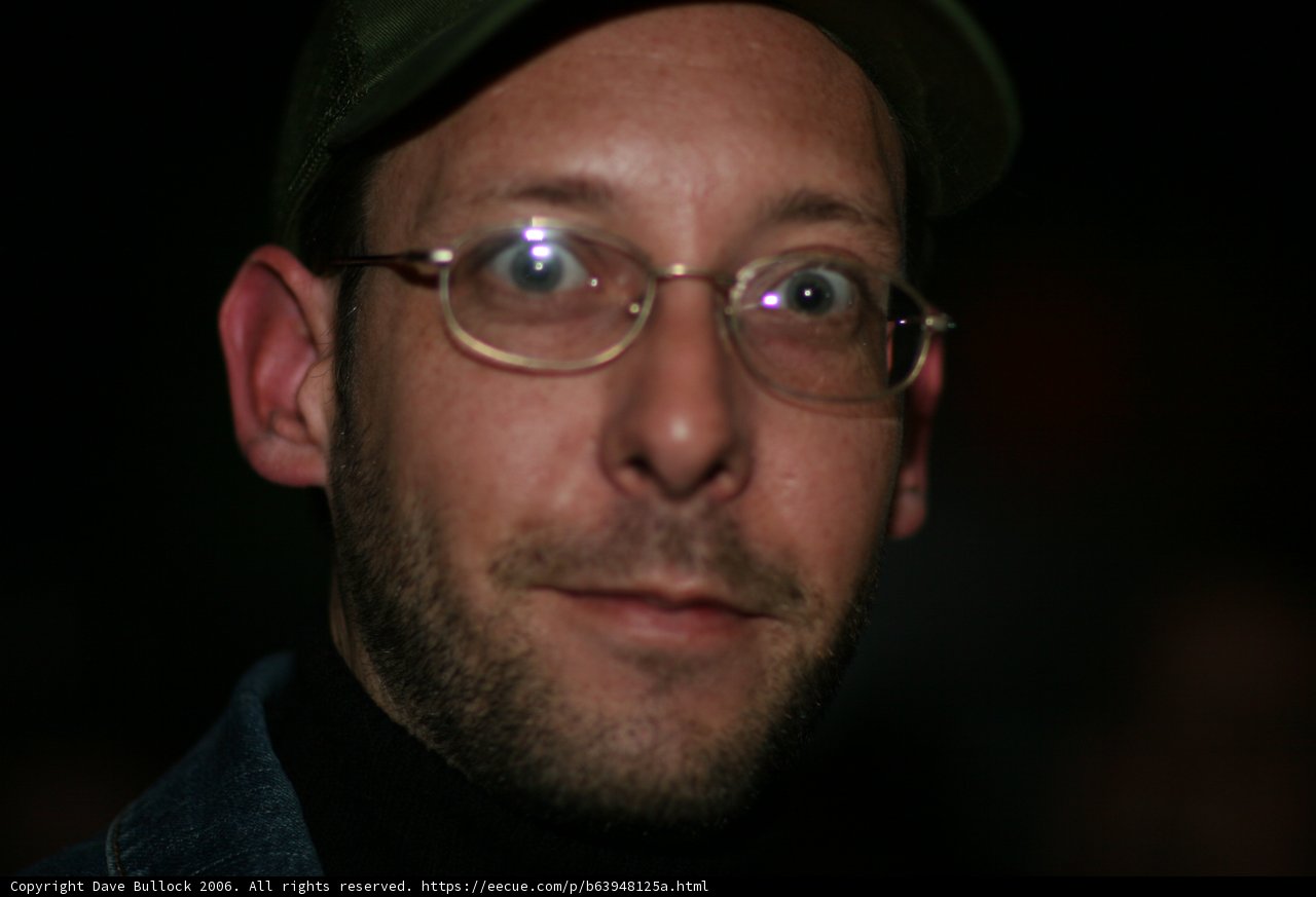 Man with Glasses and Hat