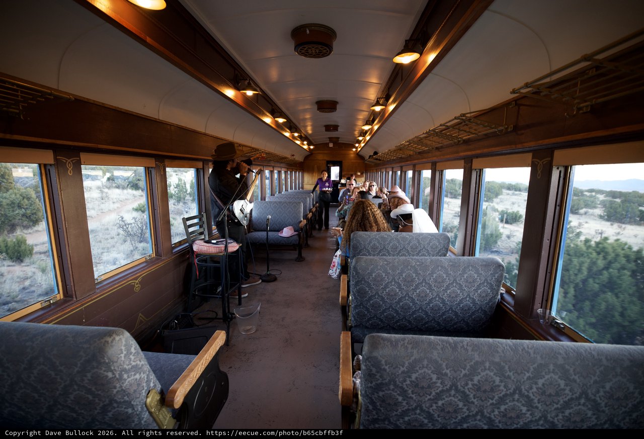 Vintage Railway Car Entertainment Experience with Cowboy Performer