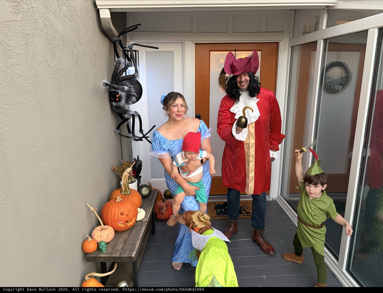 Family Peter Pan Halloween Costume Portrait on Front Porch