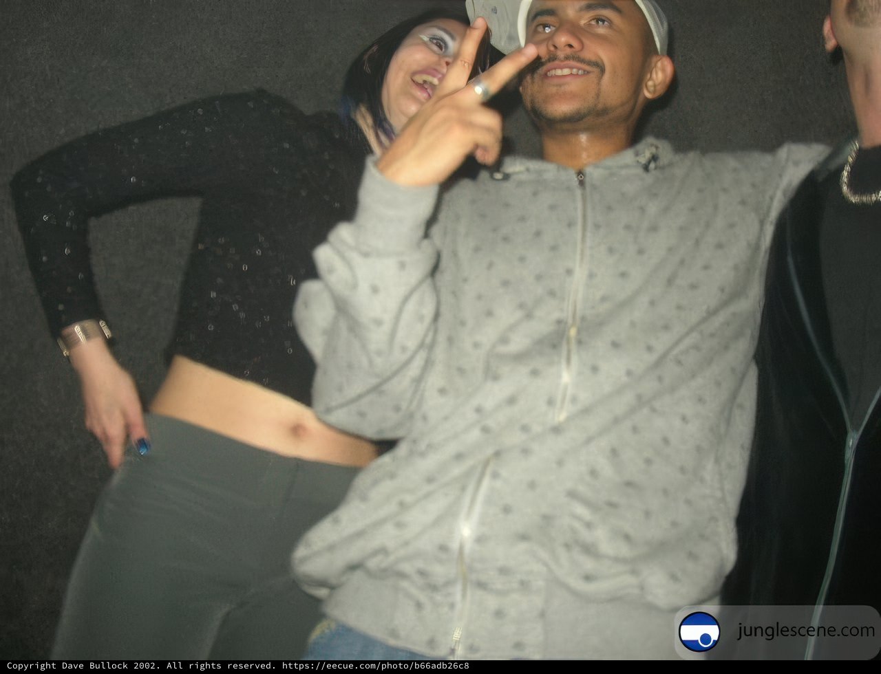 DJ Craze and Two Women Strike a Pose