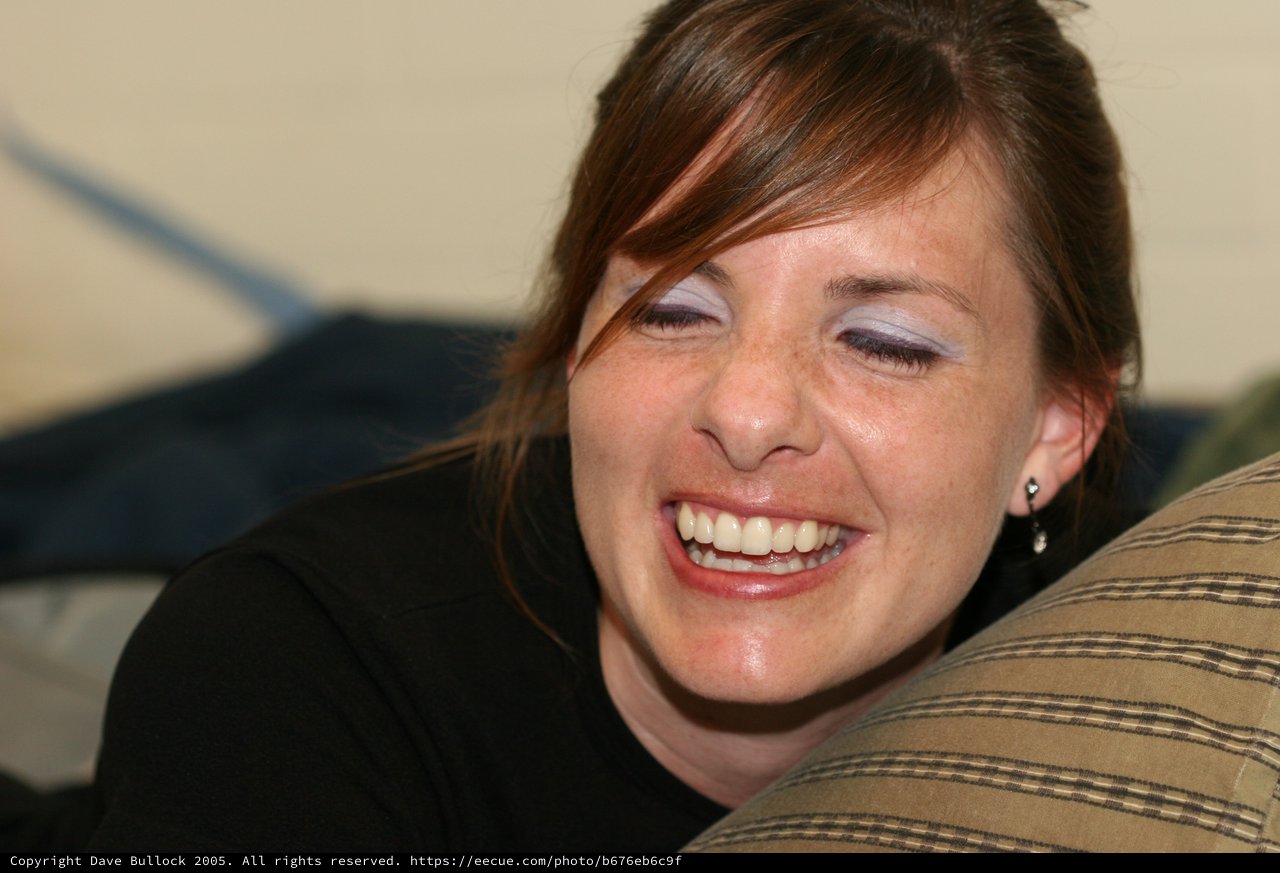 Joyful Woman Laughing on a Casual Evening
