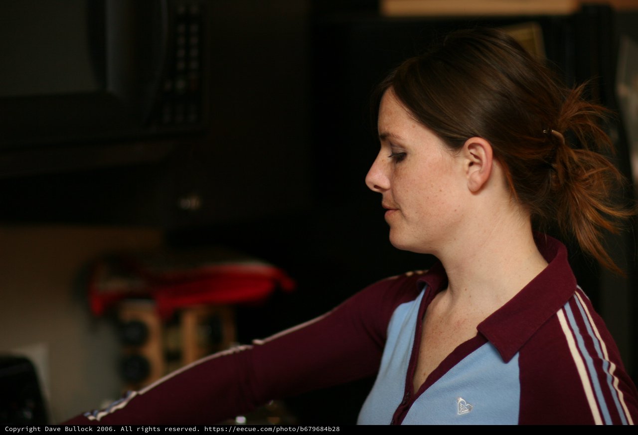 Woman in Profile Lost in Thought Indoors