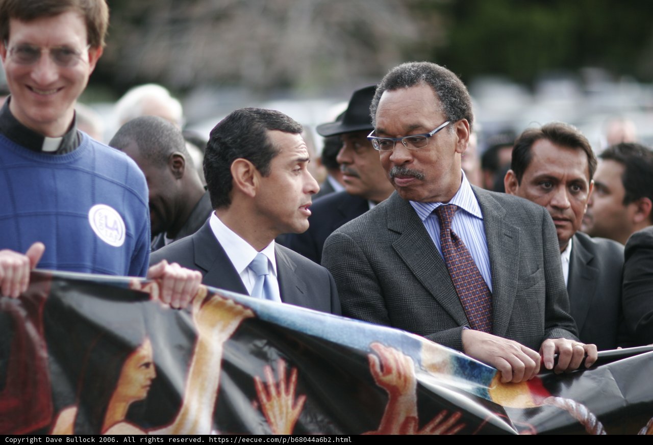 Gil Cedillo Amongst Suit and Tie Crowd