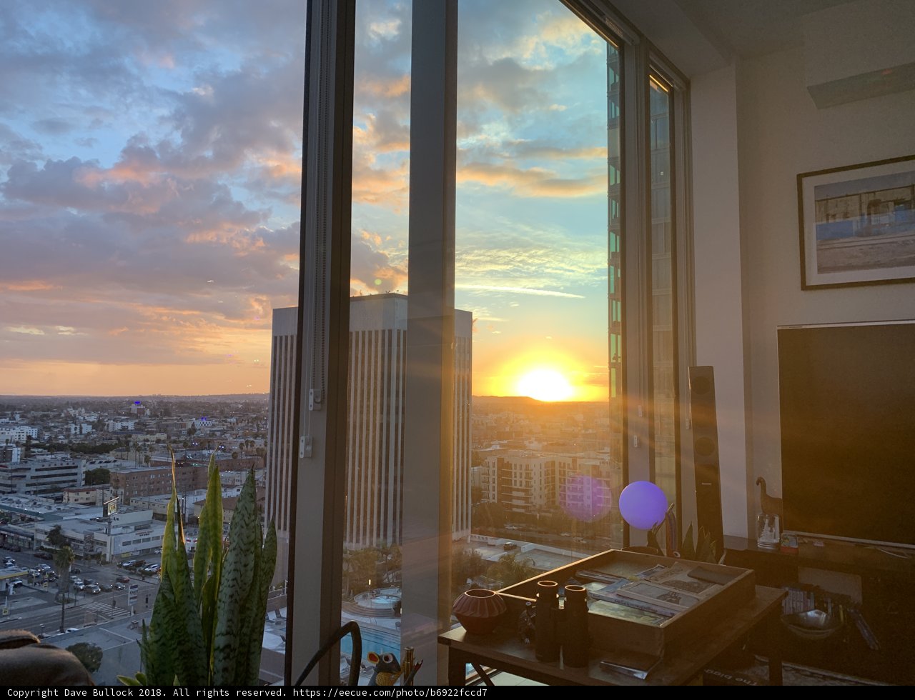 Window View of a Vibrant Sunset