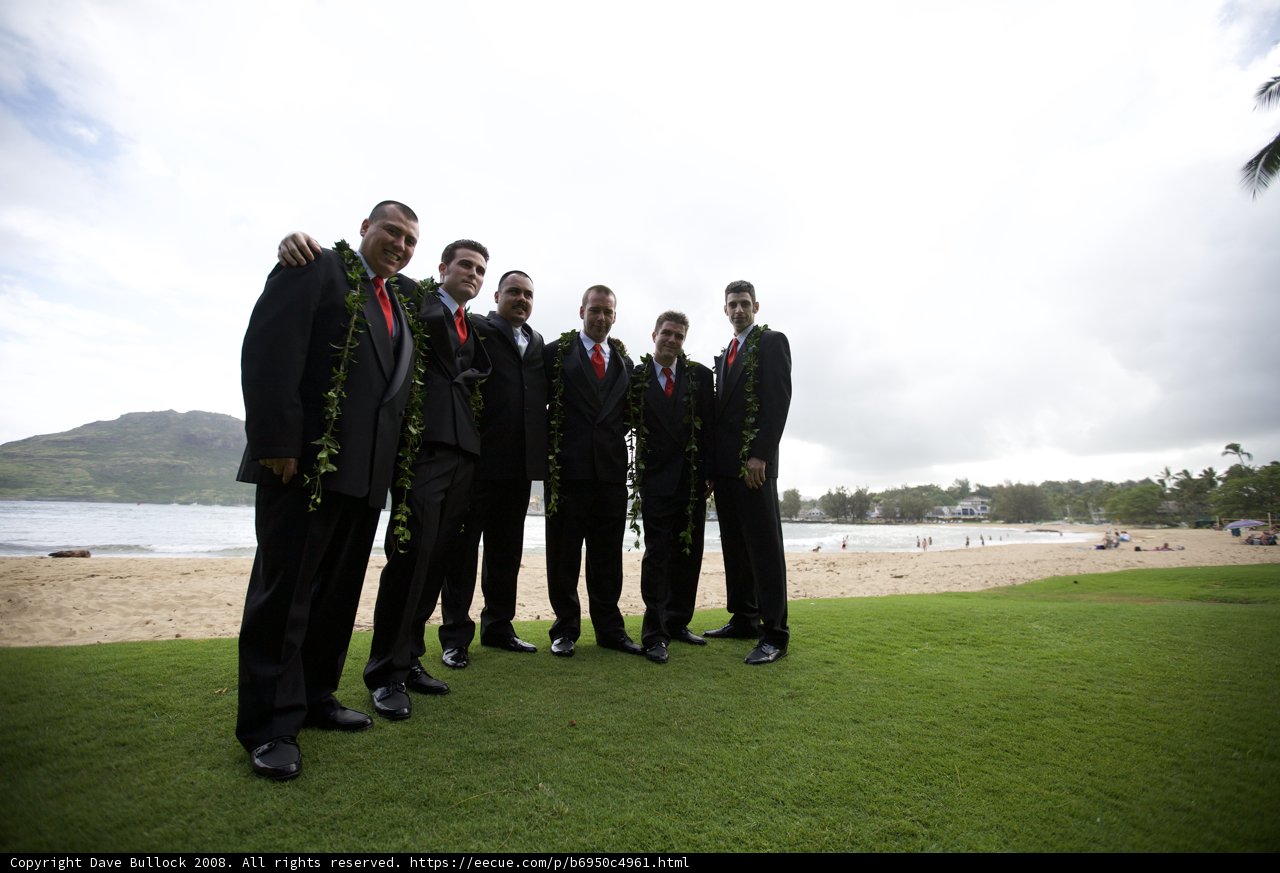 Groomsmen Celebrate The Beach Wedding