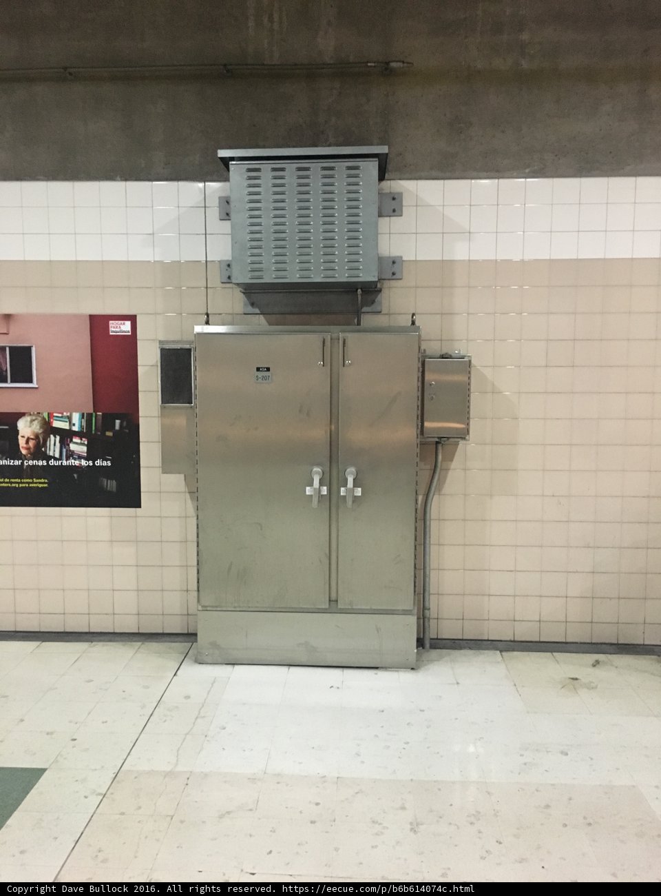 Subway Station Sign and Metal Door