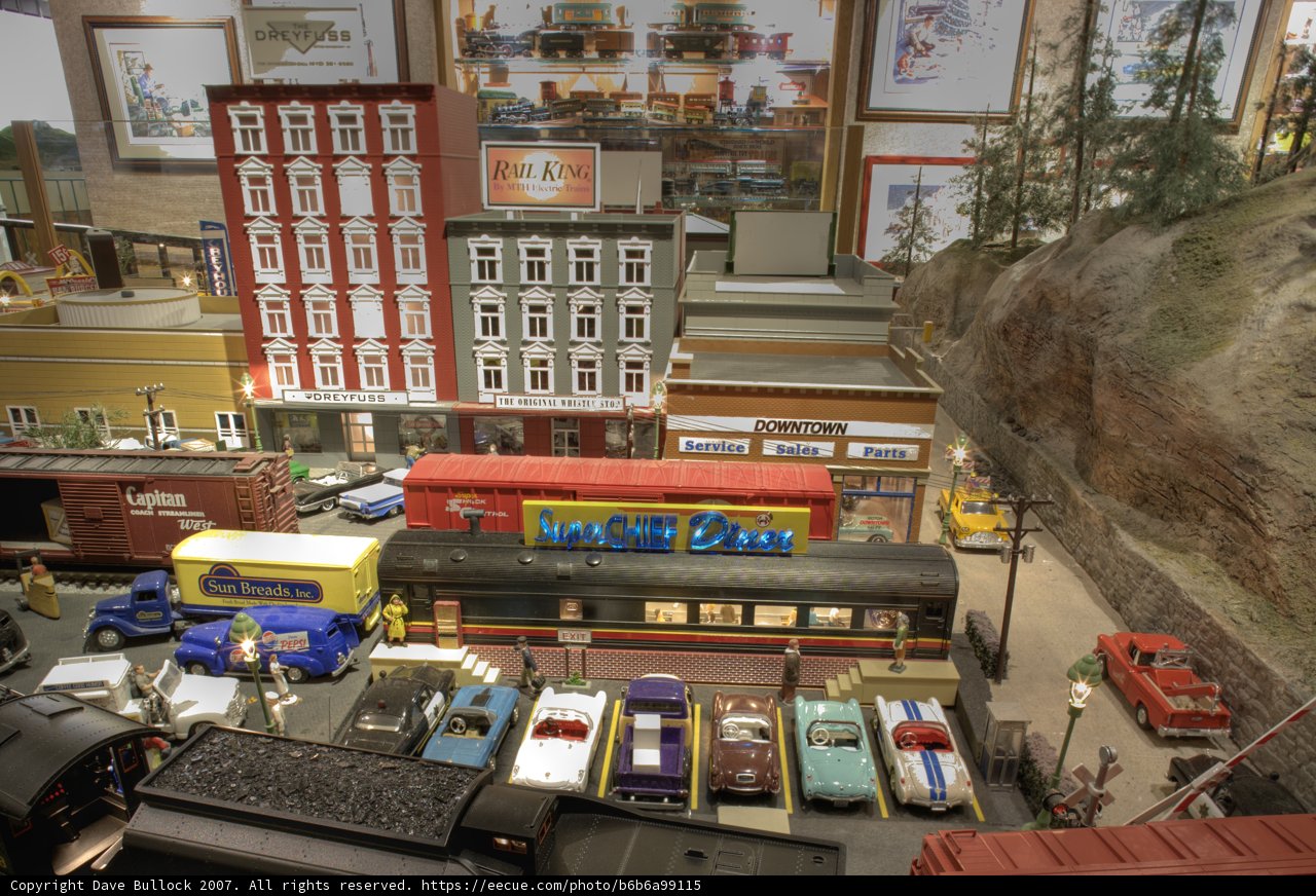 Train and Red Bus on Display