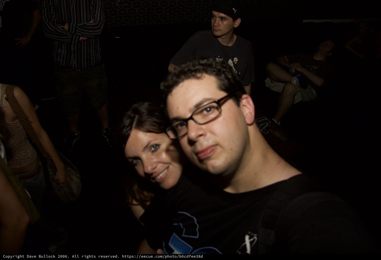 Friends Posing Together at a Nightclub Party