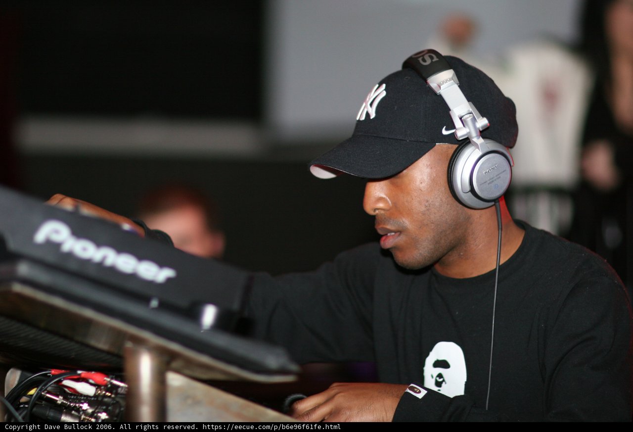 Headnodding DJ in Black Shirt