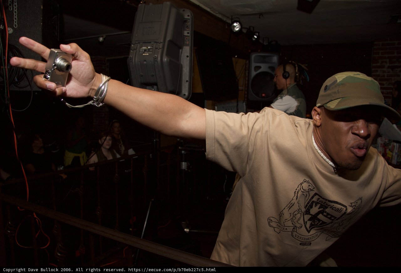 Tan Shirted Man Captures Art and Music