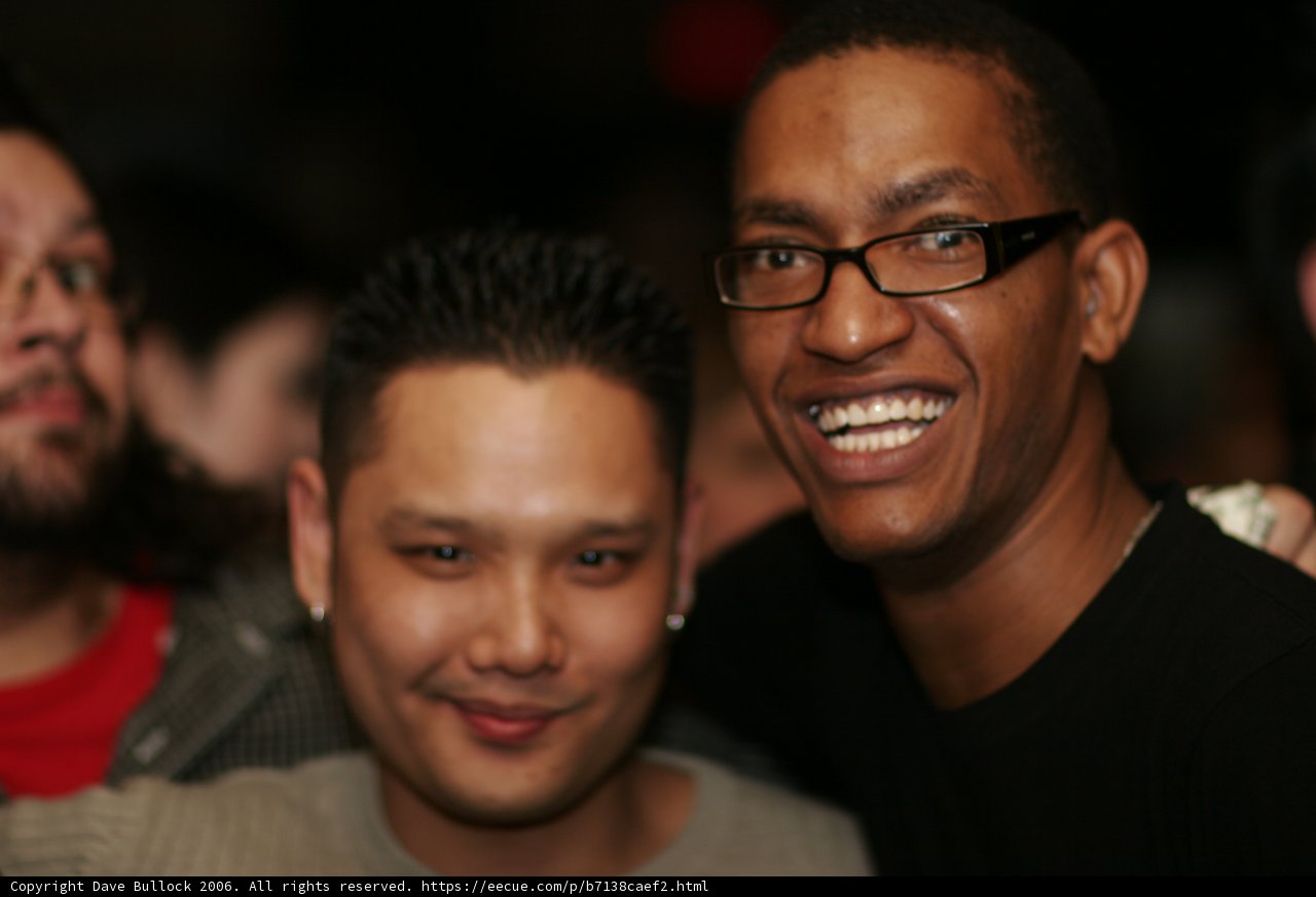Smiling Men Strike a Pose in 2006