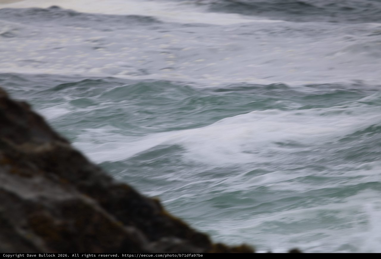 Churning Atlantic Waves Crash Against Rocky Coastline