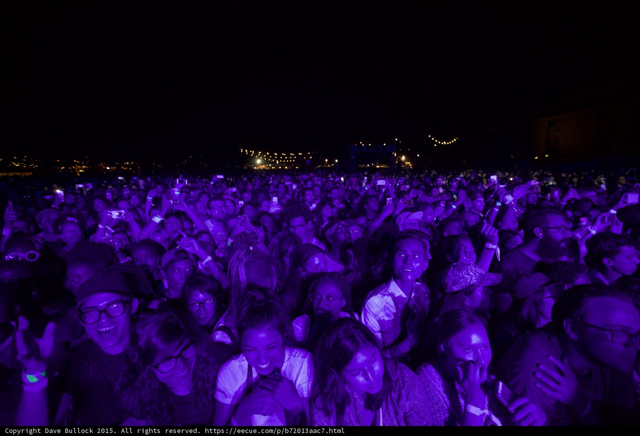 Crowd Purple Light Smiling Faces White Shirt