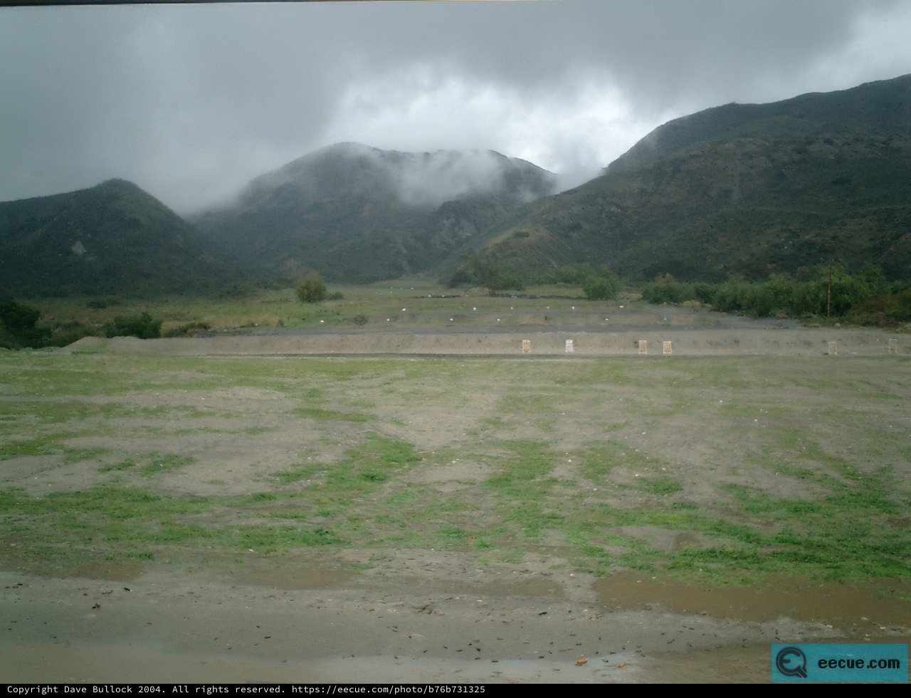 Majestic mountain range and expansive field