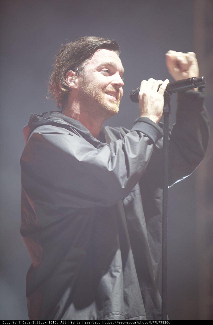 Singer Smiling Fist Up