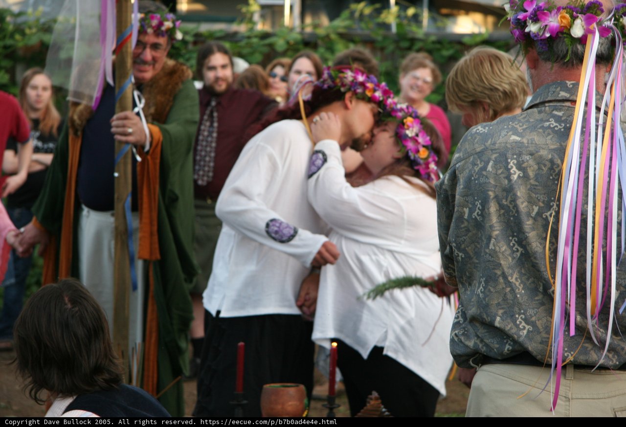 A Romantic Kiss in a Sea of Flowers