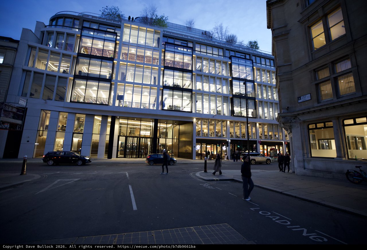 Modern Glass Office Building Illuminated at Dusk in London