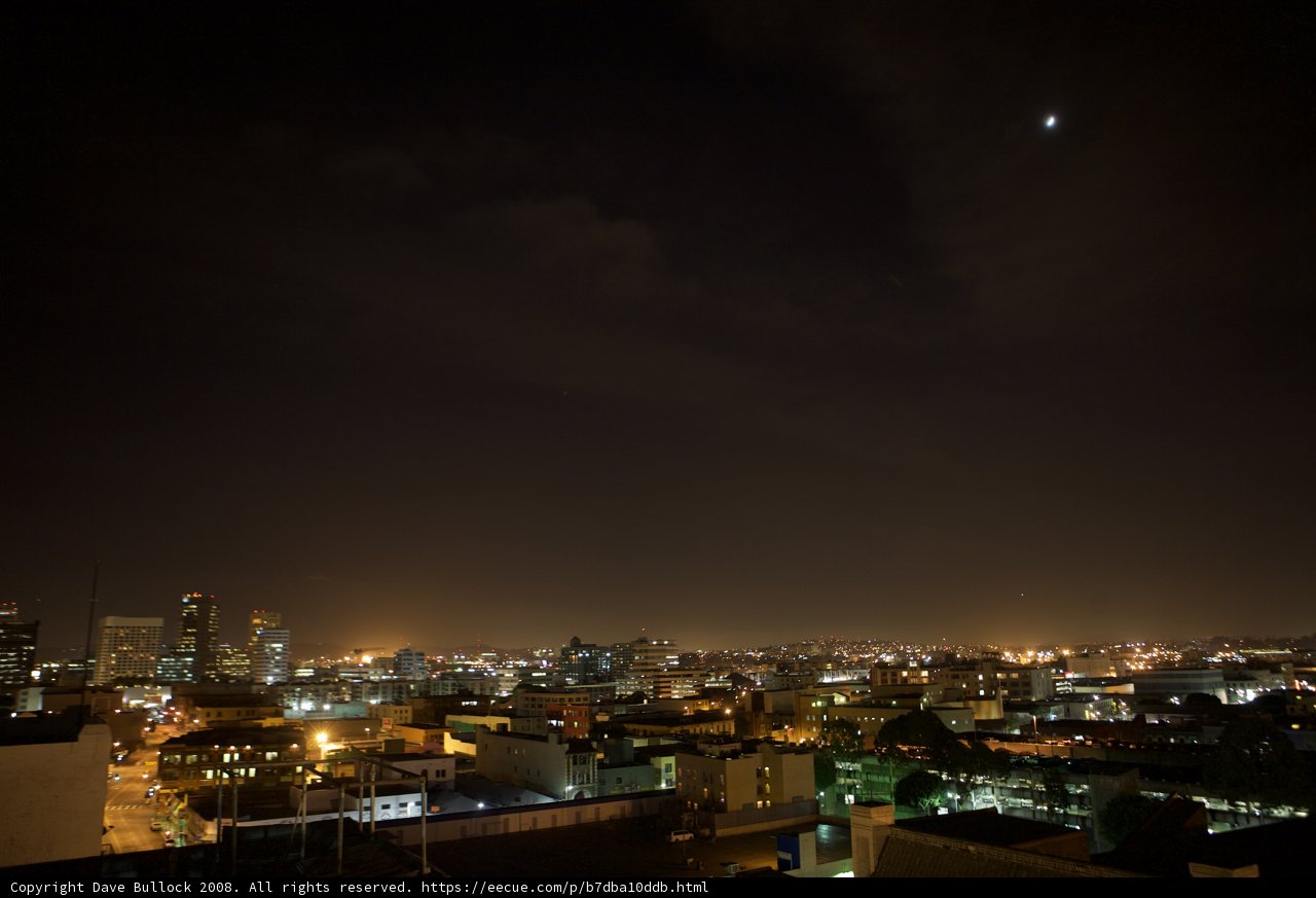 Lunar Eclipse Illuminating the Metropolis