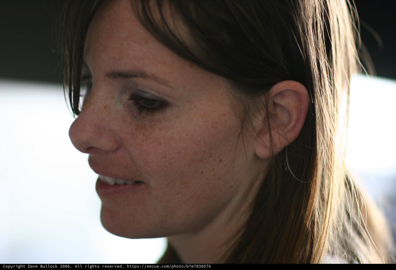 Candid Profile Portrait of a Freckled Young Woman