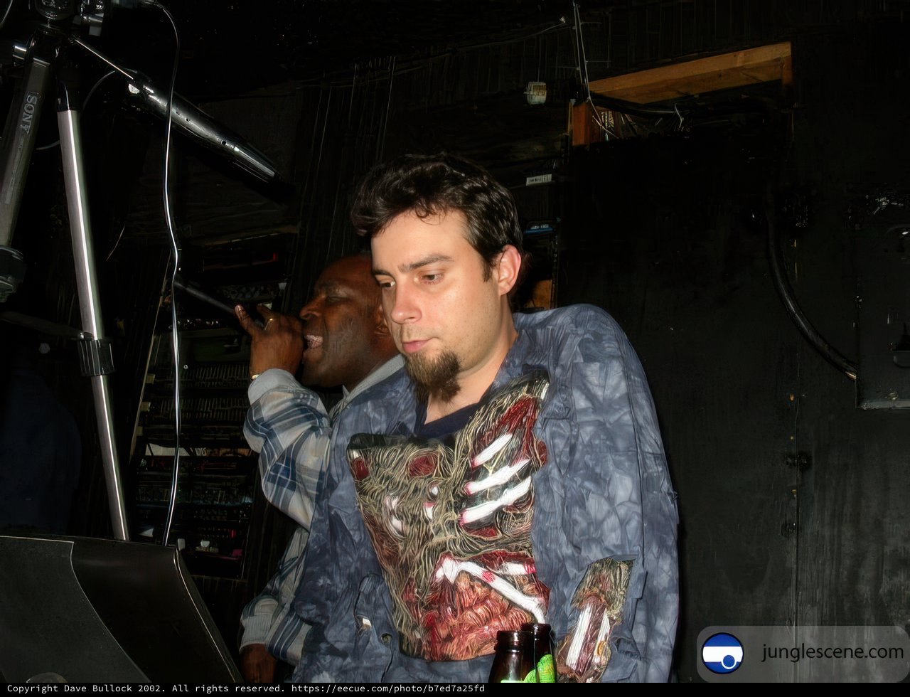 Metal-Skeleton Shirted Man Rockin' the Mic