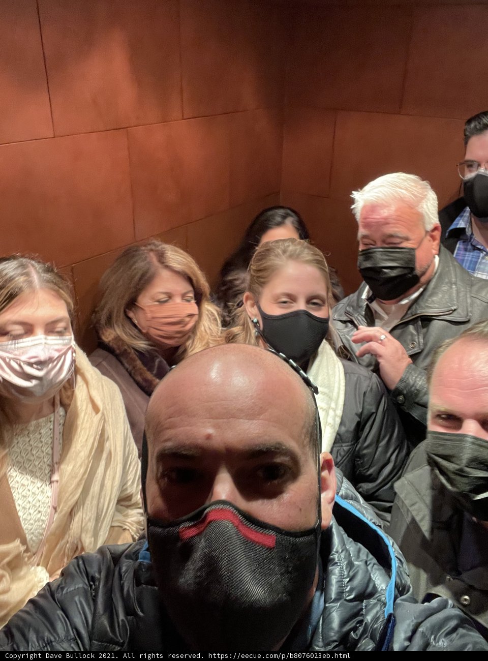 Masked Elevator Ride