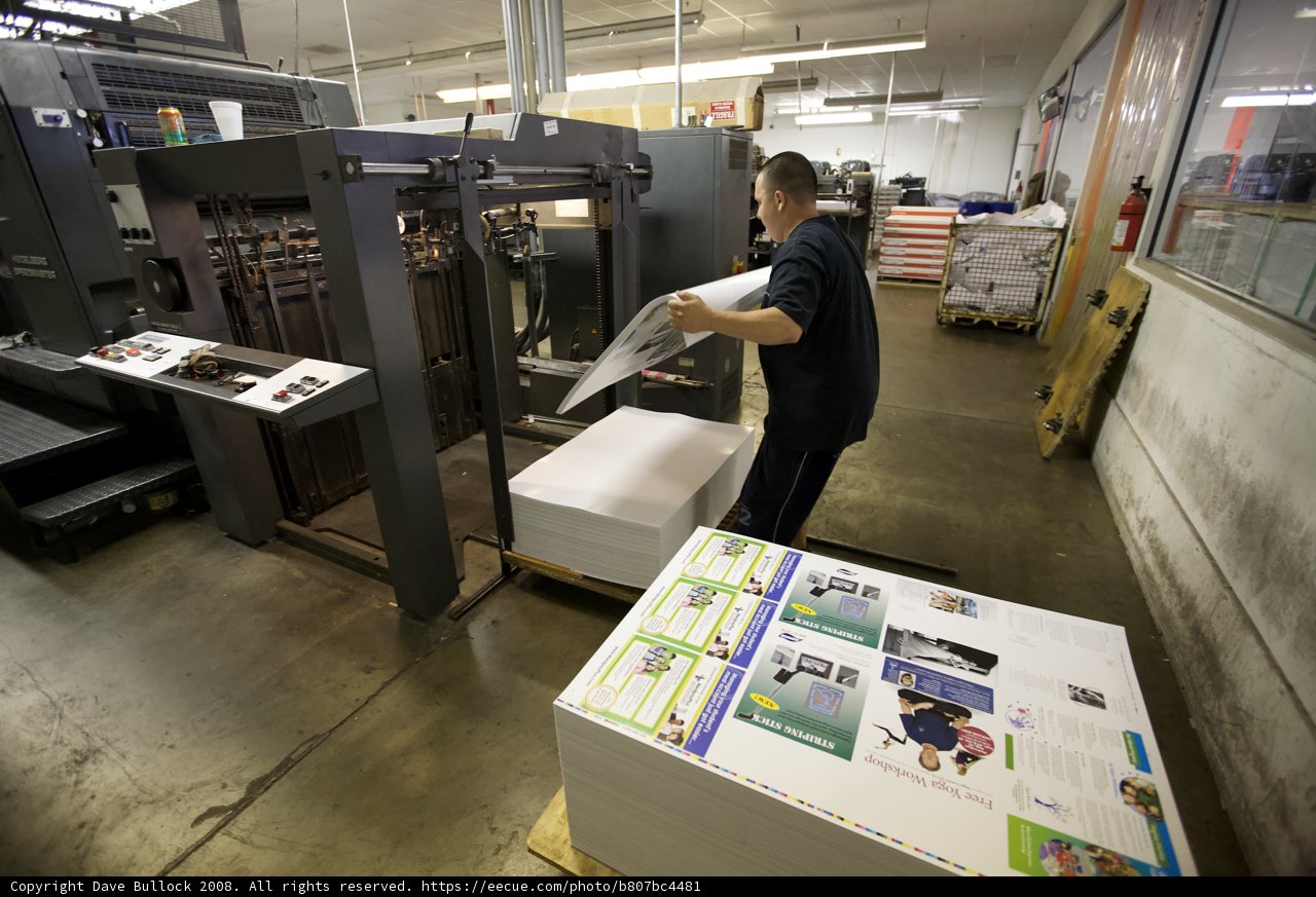 Man working on a Machine in a Factory
