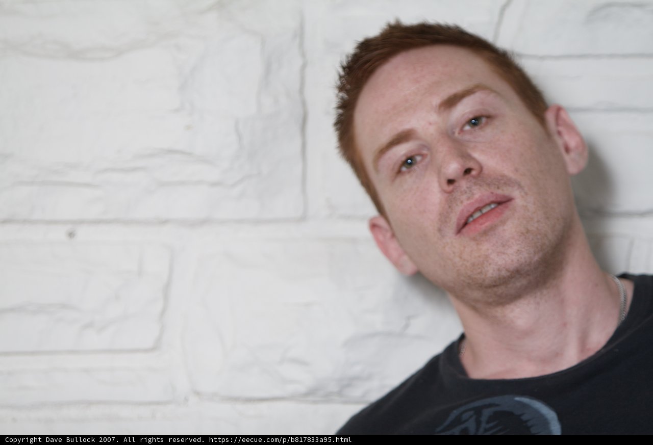 A Happy Portrait of a Freckled Man