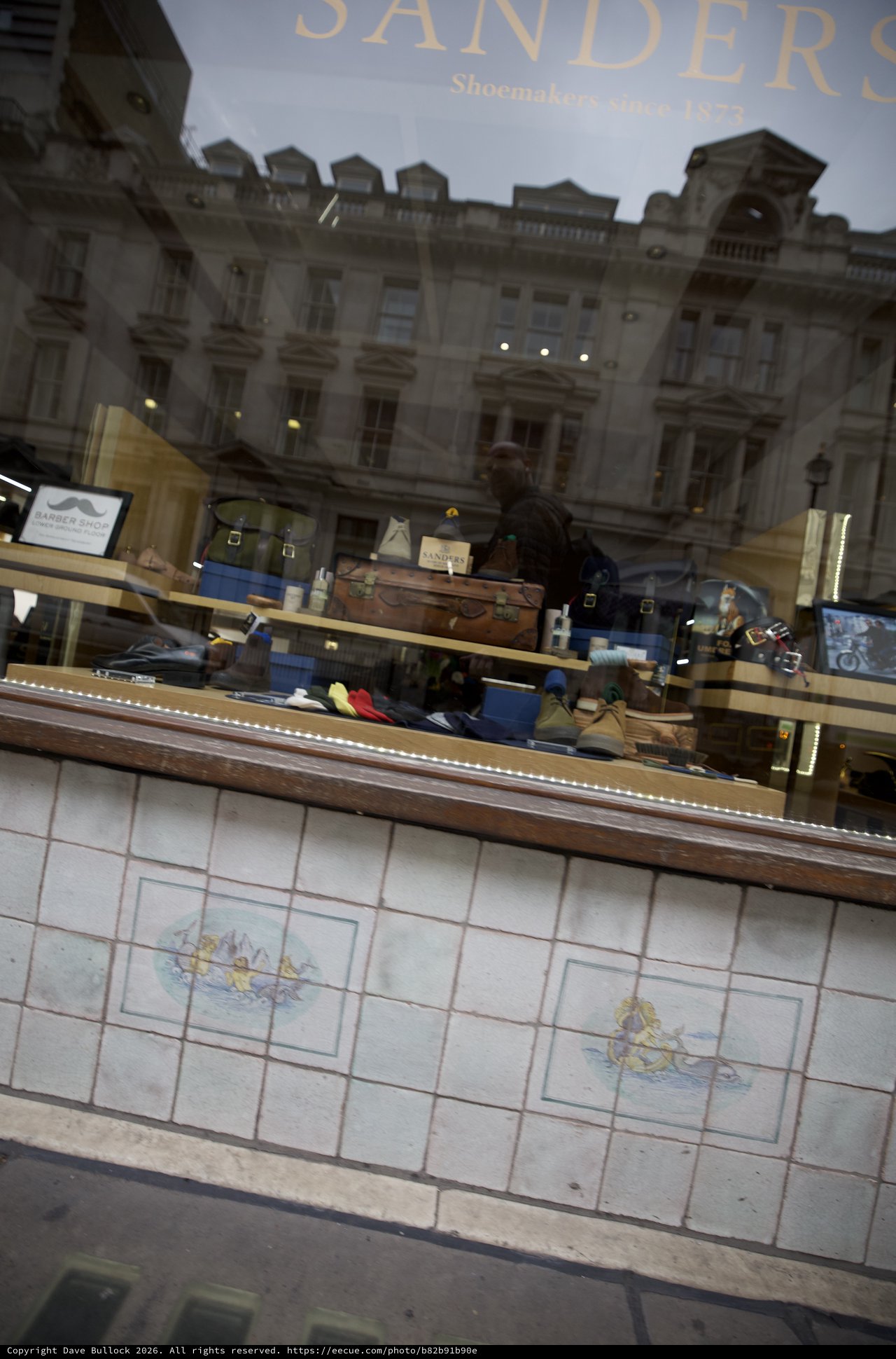 Reflection of Historic London Architecture in Shoemaker's Window