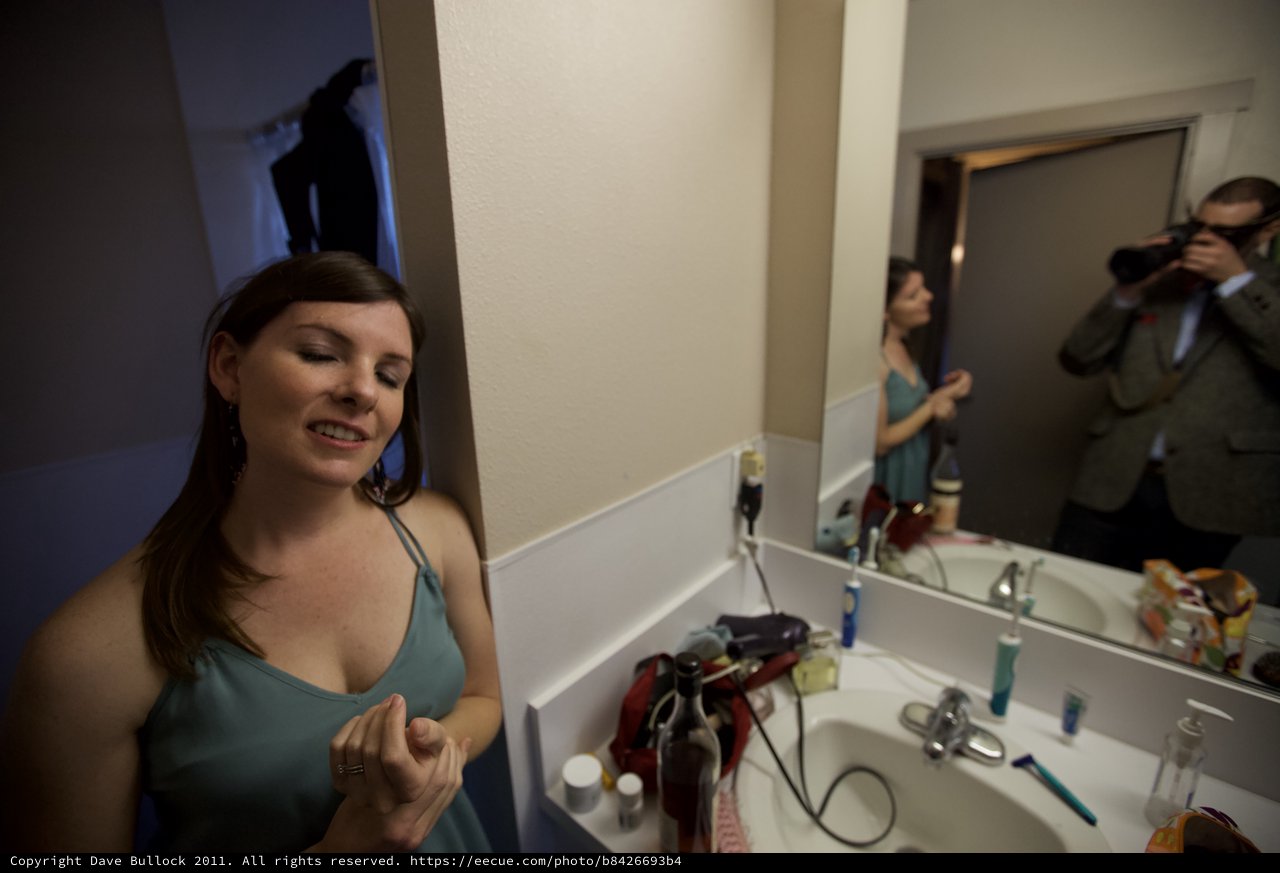 Bride Getting Ready in Bathroom Before Wedding