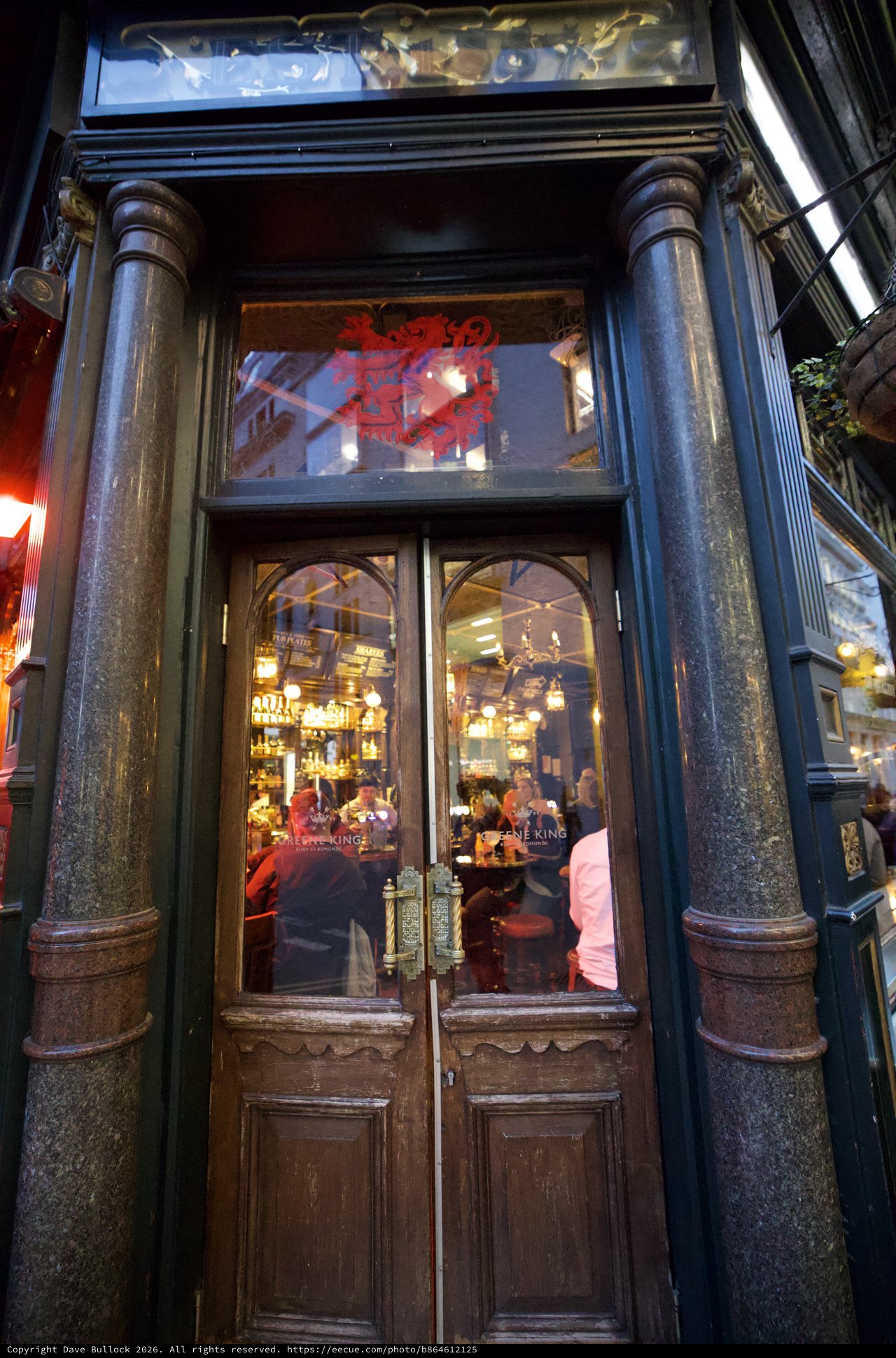 Historic London Pub Entrance with Ornate Victorian Facade
