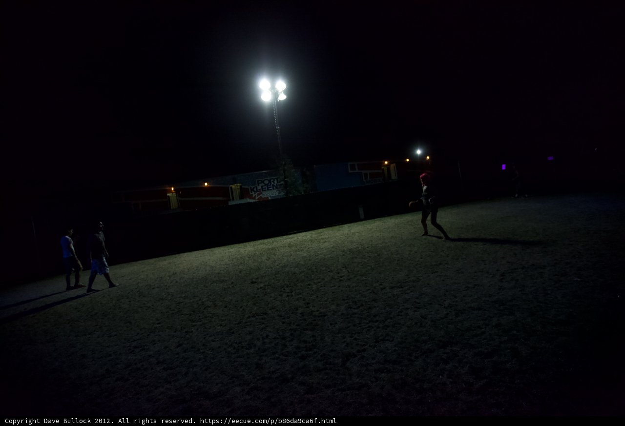 Nighttime Soccer Game Under the Lamp Post