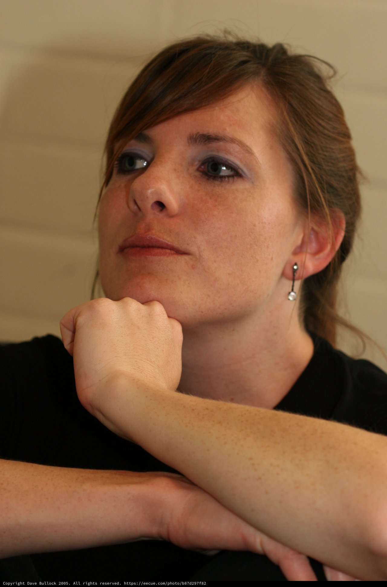 Thoughtful Young Woman in Contemplative Pose