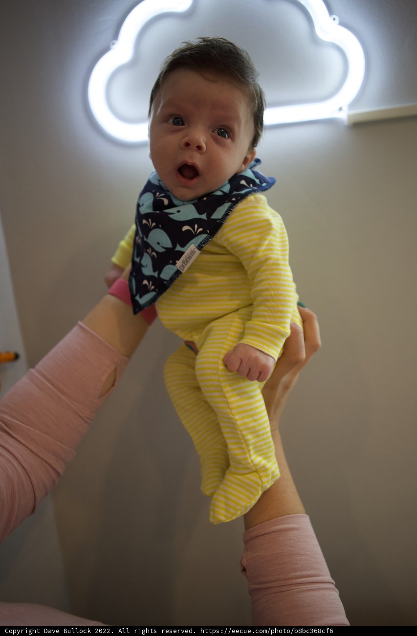 Neon Nights: A Moment of Fatherhood