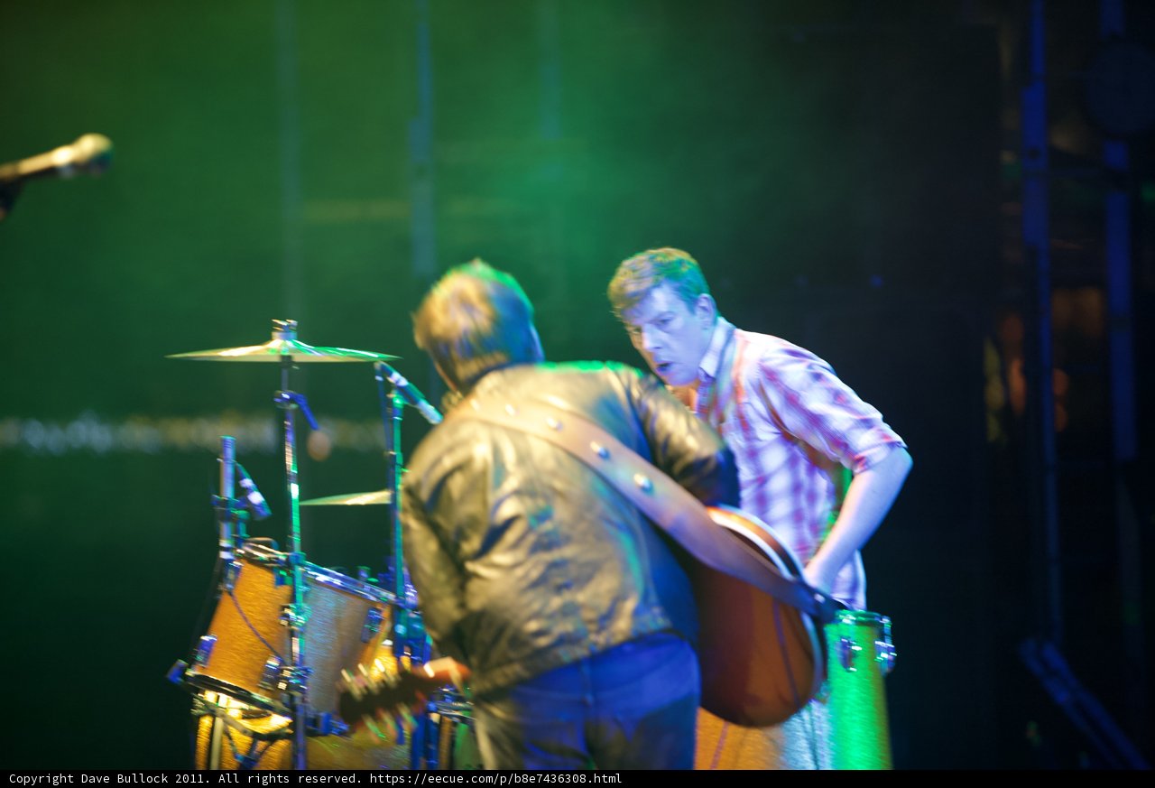 Crowd-Pleasing Concert Performance Caption: Patrick Carney and a fellow musician take the stage at Coachella 2011, captivating the audience with their dynamic drum duet.