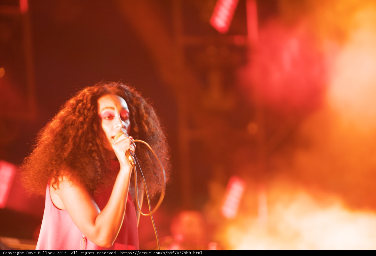 Solange Portrait Looking Up Slightly Orange Smoke Peaceful