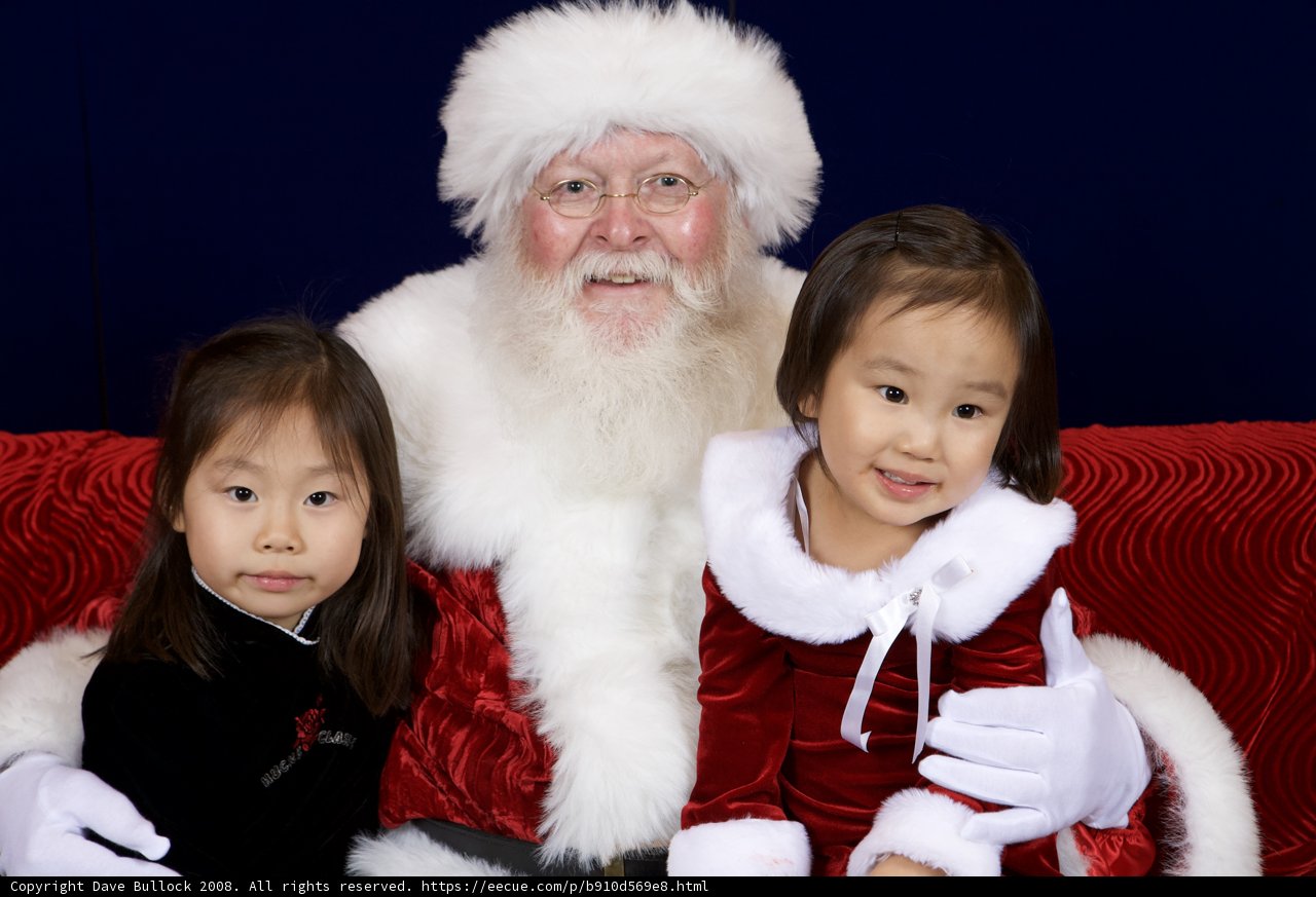 Santa Claus Visits Two Delighted Children