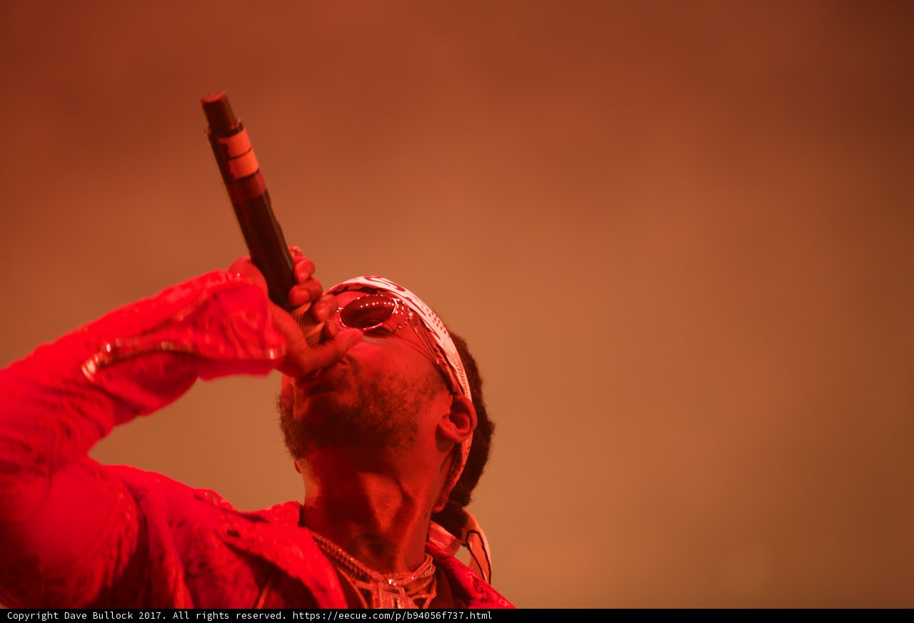 Red Jacketed Performer Wows Crowd with Microphone Skills
