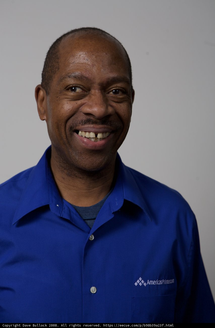 Happy Man in Blue Shirt