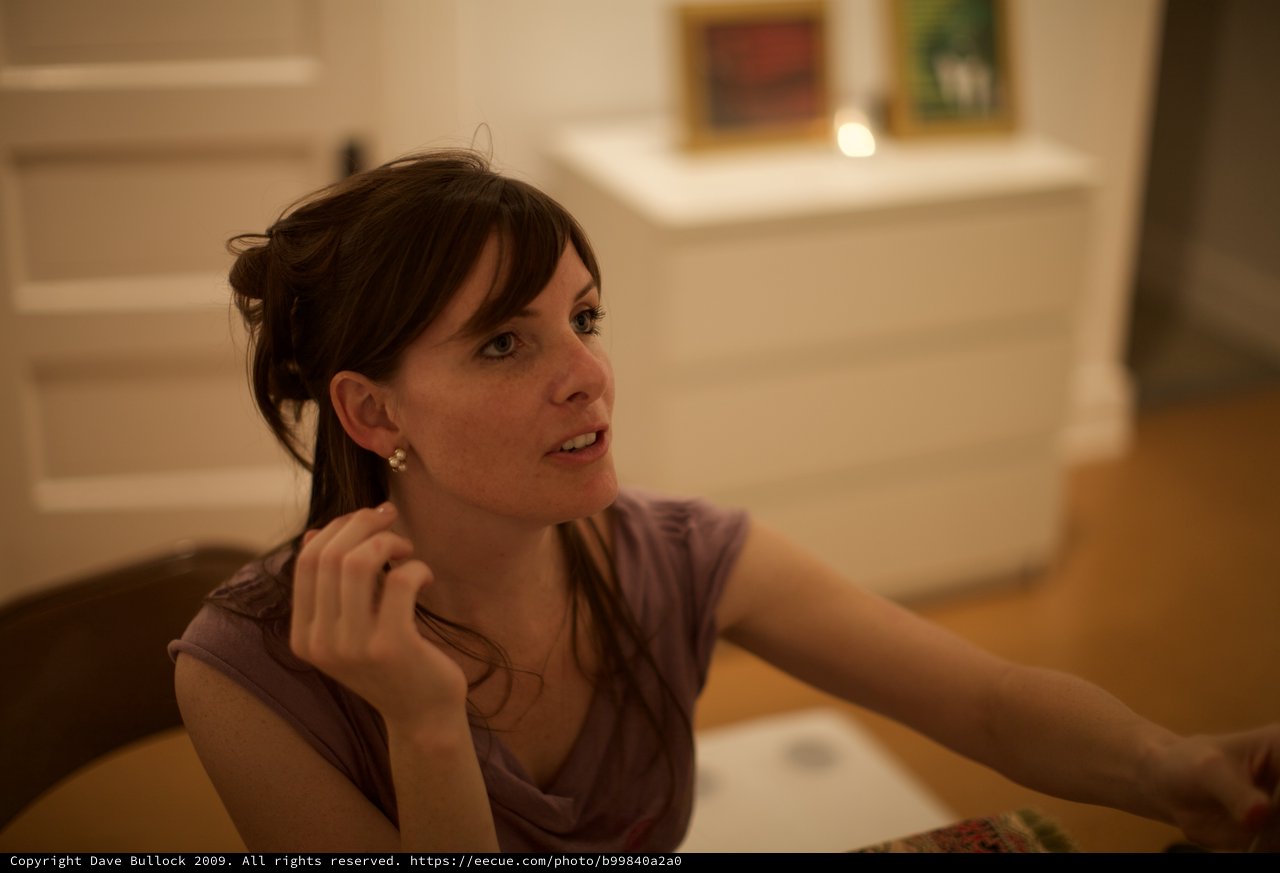 Thoughtful Young Woman at an Art Gallery Evening