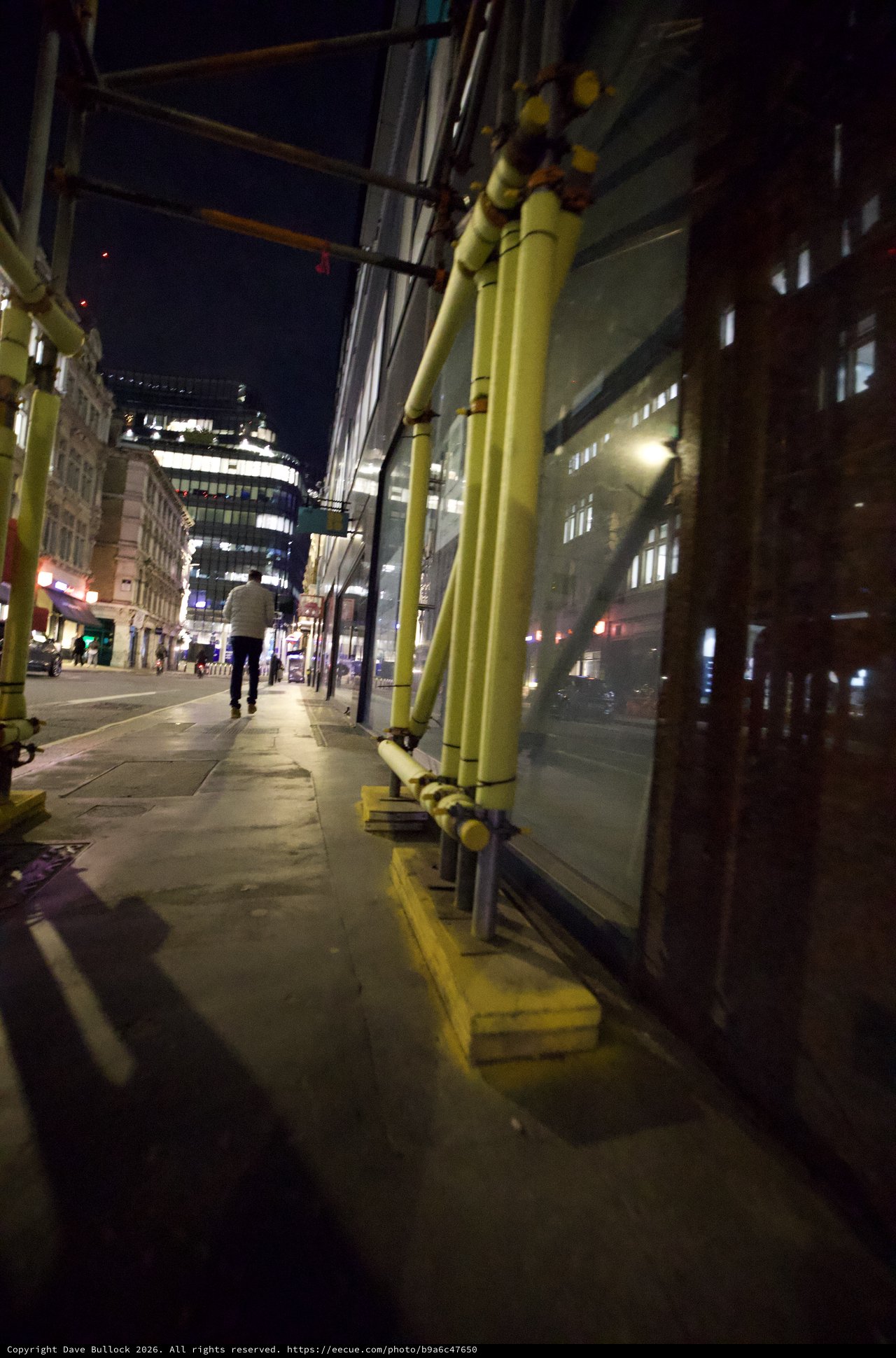 Yellow Scaffolding on London Street at Night