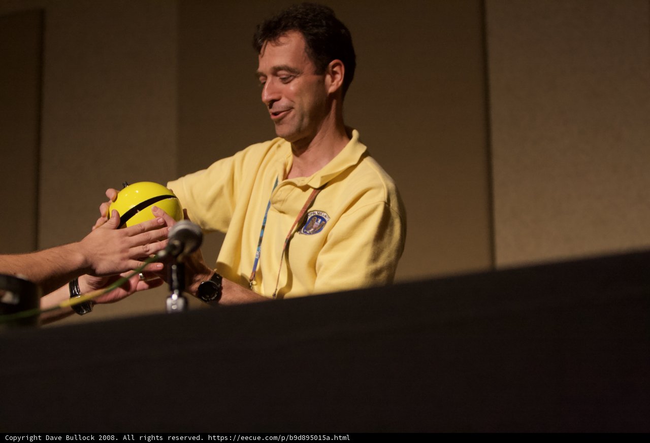 Playing Volleyball in Yellow Shirt