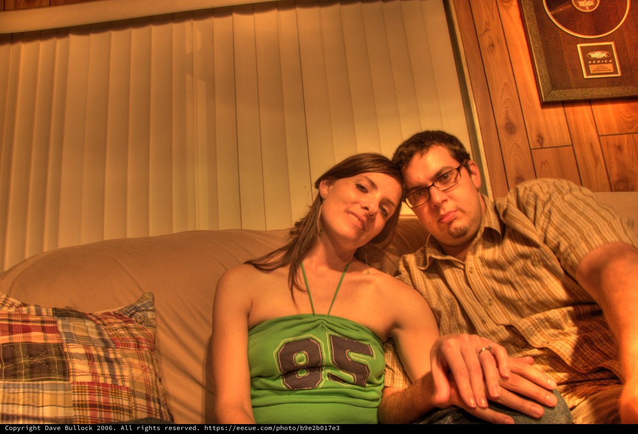 Couple Relaxing Together on Couch at Home