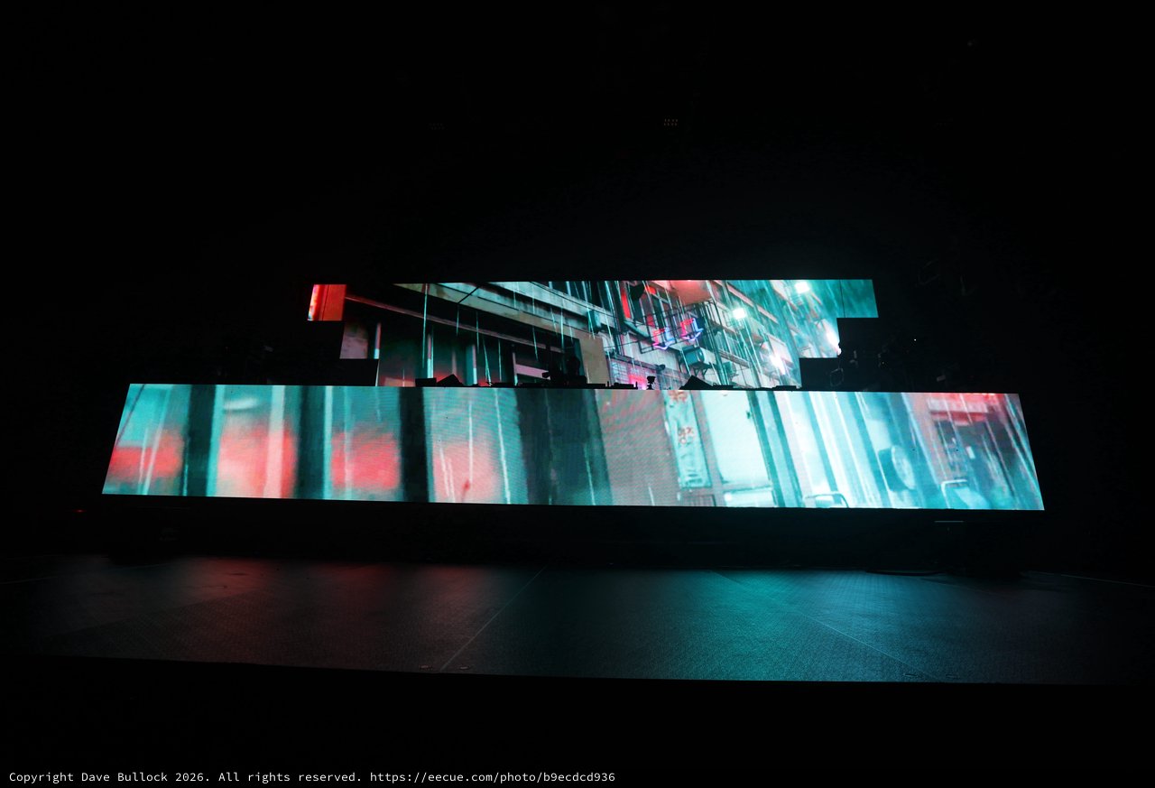 Cyberpunk Cityscape Projected Across Fragmented LED Panels