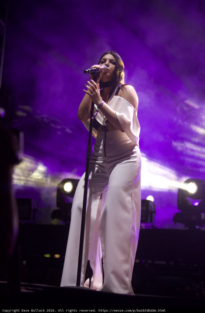 Rocking the Stage in White: A Solo Performance