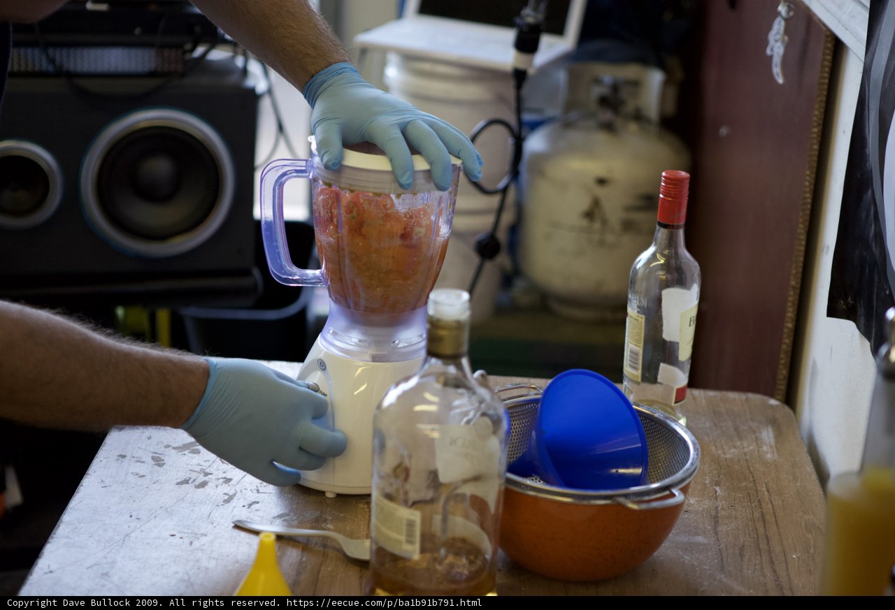 Gloved Hands Pouring Habenero Rum