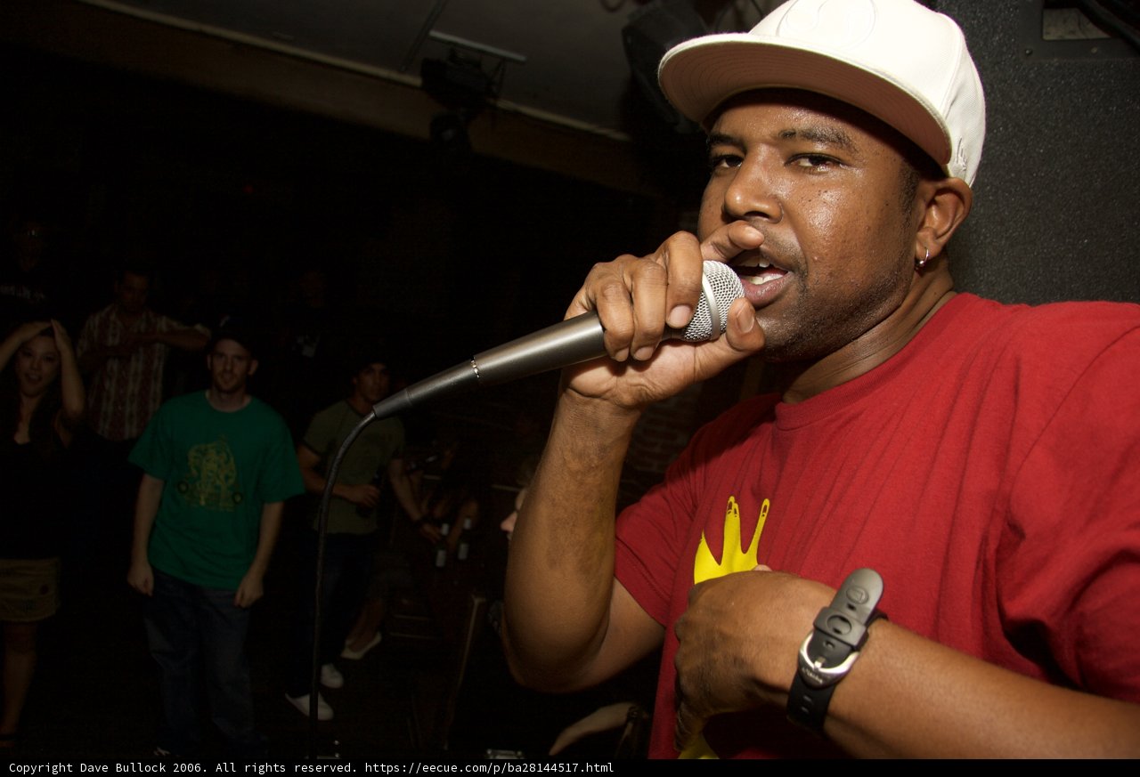 Steve J Rocks the Mic in Red Shirt